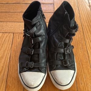 Ash black leather fashion sneaker. zips on side with functional buckles.